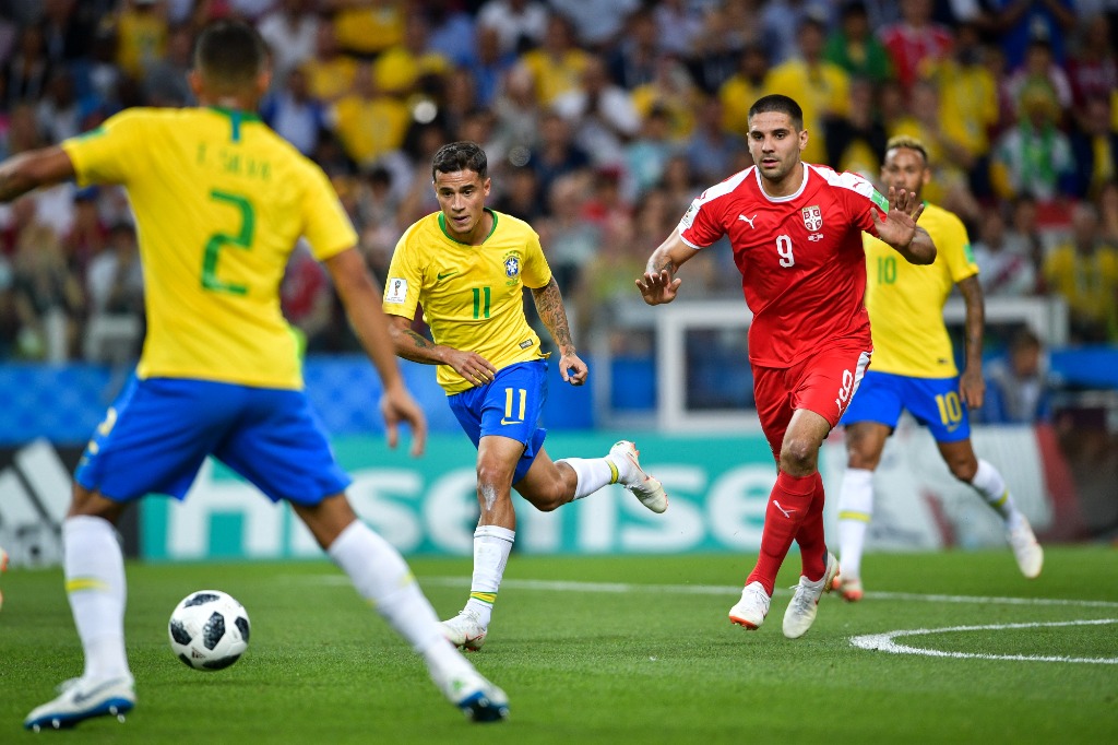 Aleksandar Mitrović in match action against Brazil next to Coutinho during 2018 World Cup